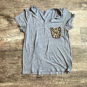 Grey V neck shirt with leopard pocket